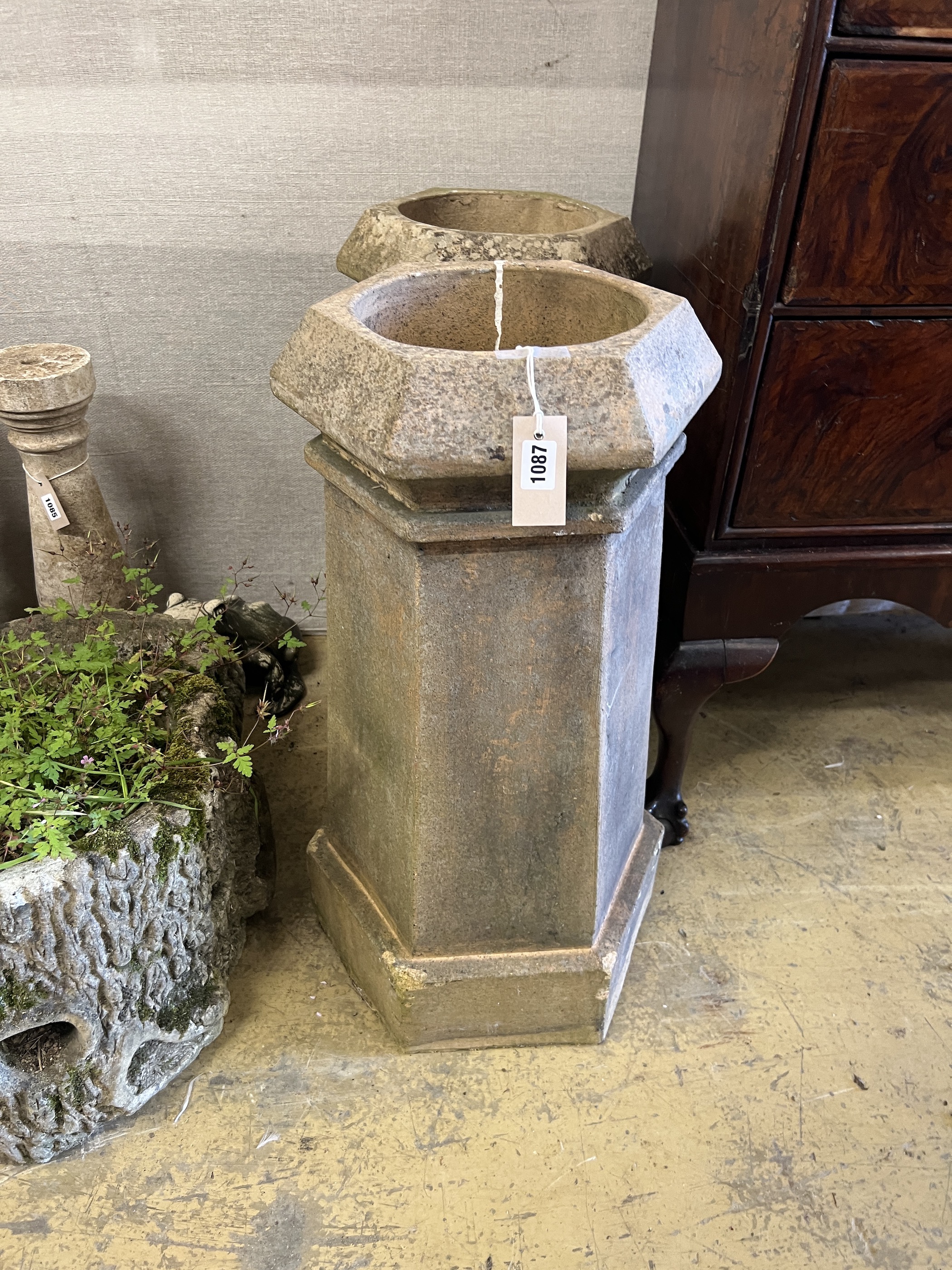 A pair of hexagonal terracotta chimney pots, height 69cm